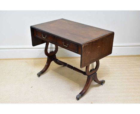 A reproduction mahogany sofa table, on lyre end supports, height 73cm, width 91cm, 55cm.