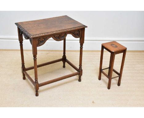 A 1920s carved oak side table on turned columns height 73cm, width 66cm, depth 45cm, and a painted oak occasional table (2).