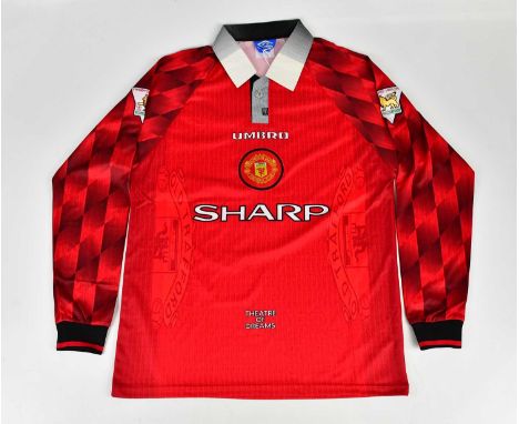 ERIC CANTONA; a signed 96/98 Manchester United retro style football shirt, signed to the reverse, size L.Condition Report: Cr