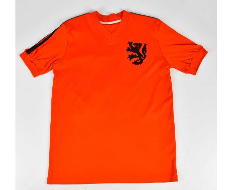 JOHANN CRUYFF; a signed Netherlands retro style football shirt, signed to the reverse.Condition Report: Creasing and light ge