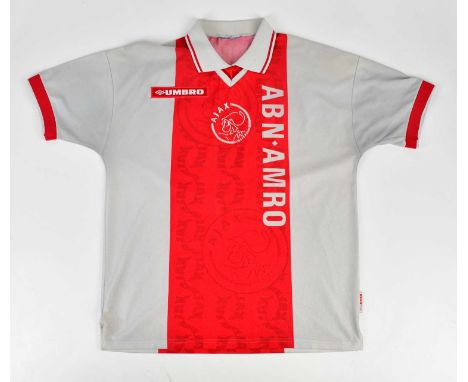 JOHANN CRUYFF; an Ajax retro style signed football shirt, signed to the reverse.Condition Report: Creasing and light general 