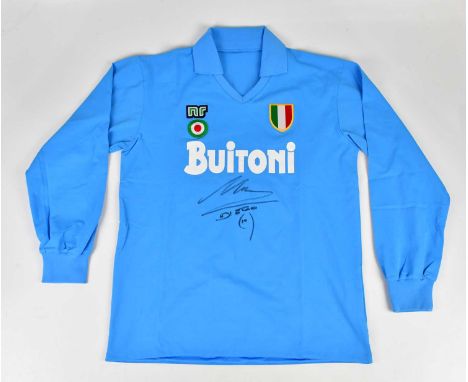 DIEGO MARADONA; a signed Napoli retro style football shirt, signed to the front.Condition Report: Creasing and light general 