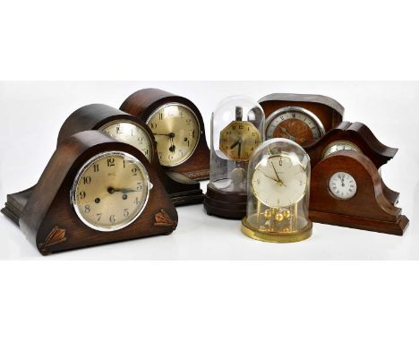 A collection of eight mantel clocks, to include a Boulle electric mantel clock with bakelite base, (dome damaged), overall he