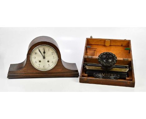 LAMBERT; an oak cased typewriter, the case with applied label 'Lambert Typewriter New York', and a 1920s Napoleon hat shaped 