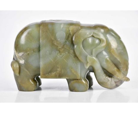 A Chinese Jade elephant, with carved decoration of auspicious symbols, height 13cm, length 19cm.Condition Report: Minor surfa