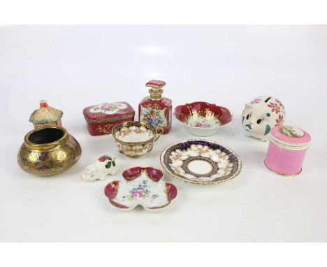 A Limoges four piece dressing table set, to include a scent bottle and stopper, with an Indian white metal and copper overlai