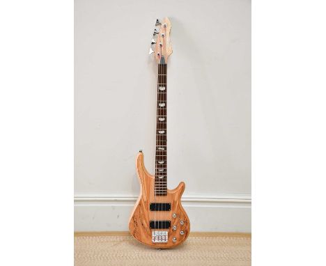 STAGG; a BA606A four string active electric bass guitar.