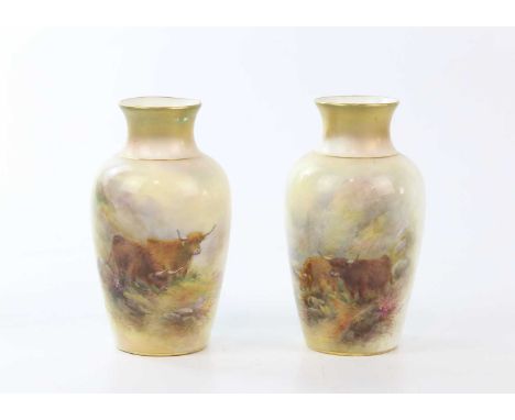 HARRY STINTON FOR ROYAL WORCESTER; a pair of hand painted vases decorated with Highland cattle, height 15cm.Condition Report: