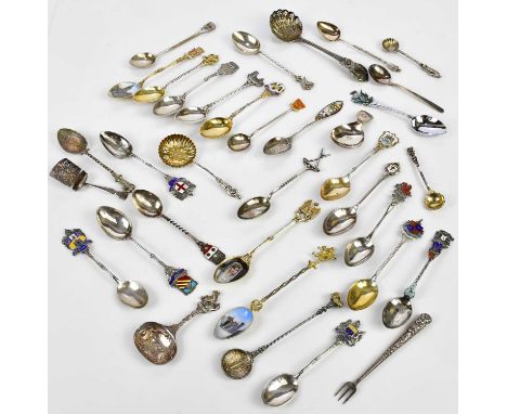A Georgian hallmarked silver caddy spoon with oval shaped bowl and bright cut decoration, a further Georgian example, a impor