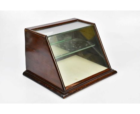 A late Victorian table top cabinet with mirror back folding door and single fixed shelf, width 39cm, depth 30cm, height 24cm 