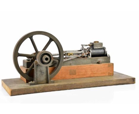 A model horizontal engine, on wooden plinth, unnamed, length 47cm.Condition Report: Main piston arm from wheel broken.