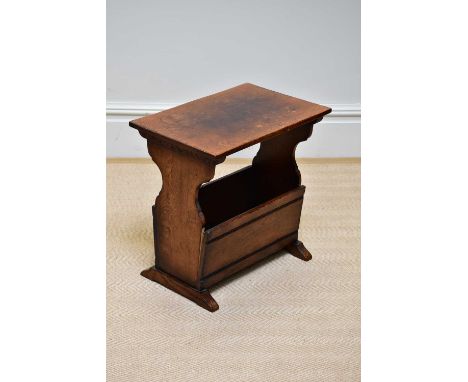 A reproduction oak magazine rack/coffee table, width 51cm, height 50cm.