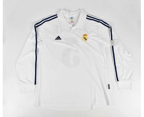 ZINEDINE ZIDANE; a Real Madrid centenary retro style football shirt, signed to the reverse, size L.Condition Report: Creasing