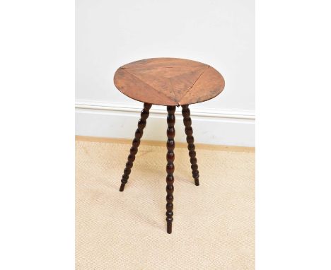 An unusual 19th century mahogany drop-leaf/gypsy table on bobbin formed supports, height 64cm.