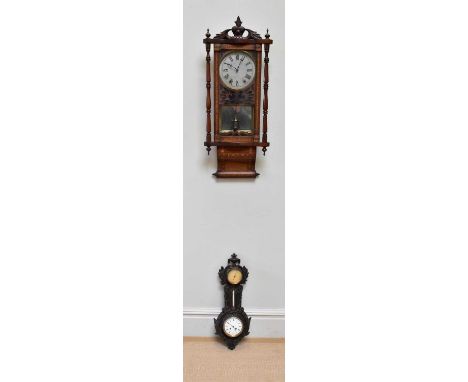 A Victorian cast bronzed metal combination clock, barometer and thermometer, length 65cmn, with a walnut Vienna style regulat