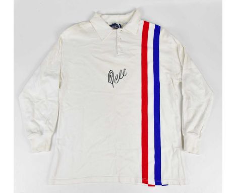 PELÉ (EDSON ARANTES DU NASCIMENTO); a signed 'Escape to Victory' retro style football shirt, signed to the front, size M.Cond