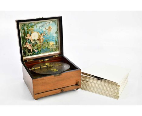 A late 19th century walnut cased Polyphon, with twenty assorted discs in card folders.Condition Report: Working at this momen