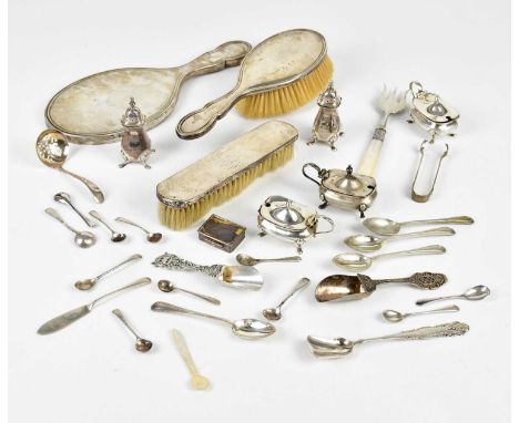 A harlequin set of five hallmarked silver cruet items, mixed dates and makers, with a selection of small condiment spoons and