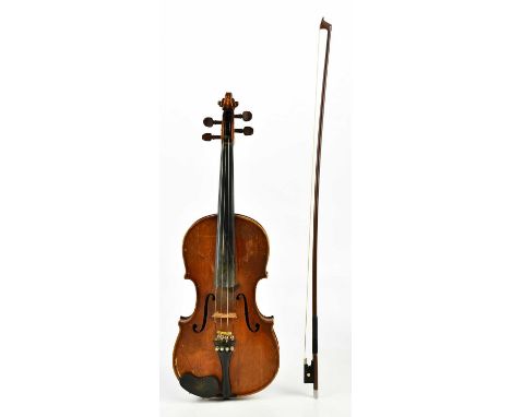 A full size German violin, Guarnerius copy with two-piece back length 35.6cm, cased with a bow.Condition Report: Crack to tab