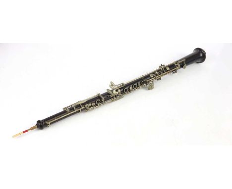 A modern ebonised oboe, cased.