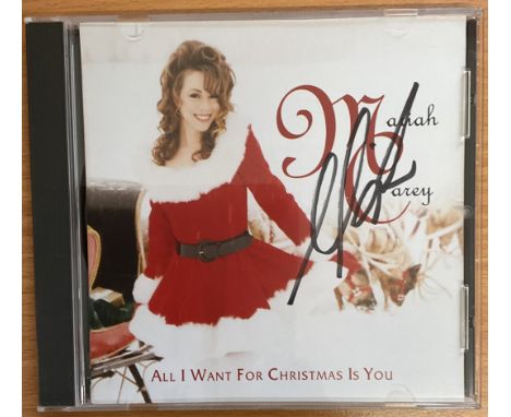 Music Mariah Carey Signed All I Want For Christmas Is You CD Sleeve With CD Included. Used Condition, But In Good Condition. 
