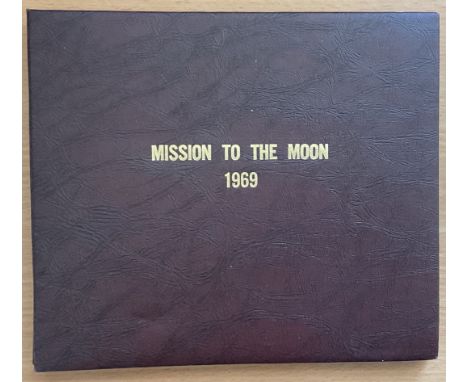 Mission To The Moon 1969 (Apollo 11) Commemorative First Generation Inter-Negative Photo Collection. Housed in a Leather Wrap
