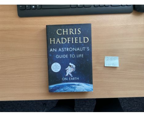 Astronaut Chris Hadfield Signed in His own Book Titled An Astronaut's Guide to Life on Earth. 1st Edition Hardback book. Sign