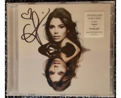 Music Christina Perri Signed Head Or Heart CD Sleeve With CD Included. Brand New in Original Packaging. Good condition. All a