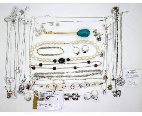 A silver Tahitian cultured black pearl and peridot bangle, and a pearl and black spinel pendant, both with certificates a sil