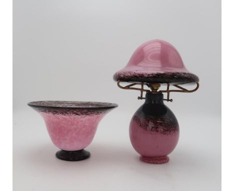 A Monart style glass table lamp, the bulbous base with mushroom shaped shade, in mottled pink with black and gold aventurine,