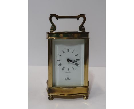 An Imperial brass-cased carriage clock, with Fema movement and Roman numeral Condition Report:Available upon request