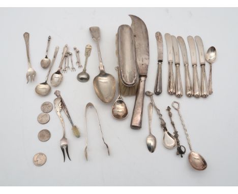 A collection of silver including a Victorian serving spoon, by&nbsp;Samuel Hayne &amp; Dudley Cater, London, with retailer's 