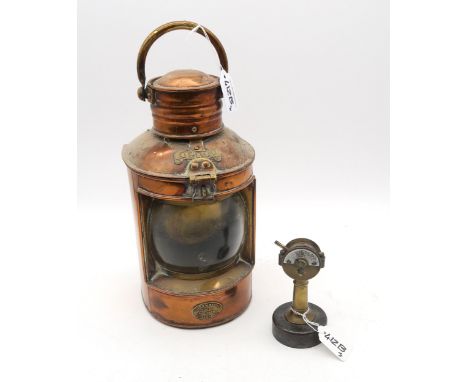 A ship's copper and brass stern lantern by Capt. O.M. Watts Ltd., Yacht Equipment, London, together with a miniature engine o