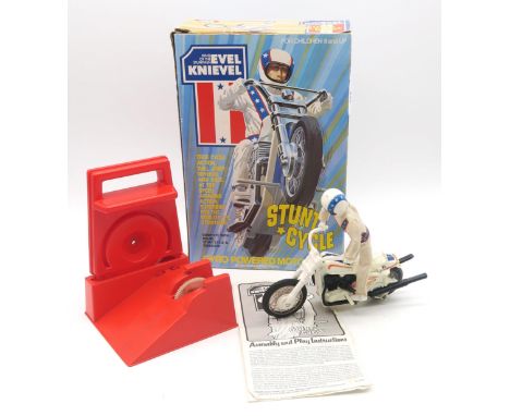 A boxed Evel Knievel Stunt Cycle by Ideal Toys, retaining its original instruction leaflet Condition Report:Available upon re