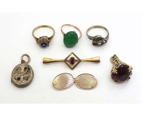 A Chinese gold ring set with green glass, a 9ct gold gem set flower ring, a 9ct and silver three gem ring, 9ct brooch a seal 