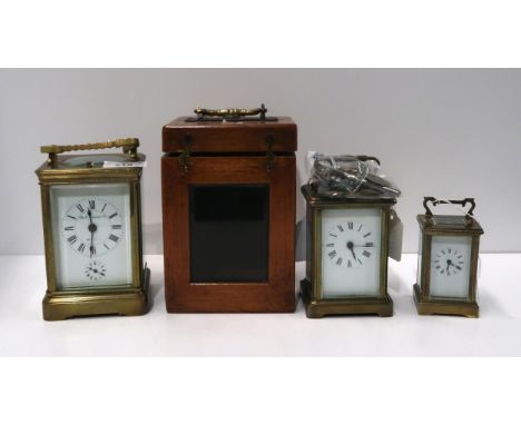 A brass and glass repeating carriage clock marked Ch.J. Gaupp &amp; Co and two smaller carriage clocks Condition Report:Avail