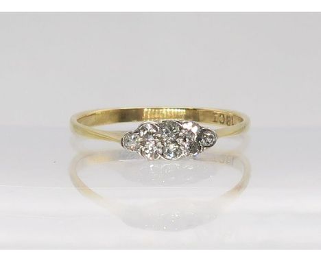 A vintage 18ct gold diamond cluster ring set with estimated approx 0.20cts of eight cut diamonds, finger size M1/2, weight 1.