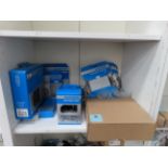Shelf of Various Shimano Cycling Components including Shifting Lever, Brake Lever,
