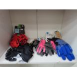 Shelf of Cycling Clothing Accessories including Pearl Izumi Gloves, Maddison Neck Tubes, Ale Cycling