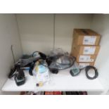Shelf of E-Bike Accessories including Bosch Control/Display Units