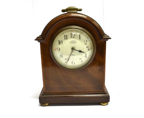 AN EDWARDIAN MAHOGANY MANTLE CLOCK  with crossbanded and inlaid decoration, the enamel dial inscribed 'Mappin &amp; Webb', 16