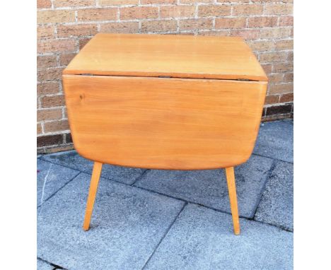 AN ERCOL LIGHT ELM AND BEECH DROP LEAF TABLE  64cm wide (140cm with both leaves) 74cm deep