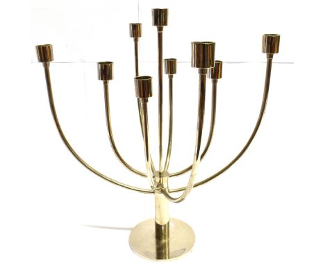 A SCANDINAVIAN STYLE NINE LIGHT METAL CANDELABRA  the four pairs of swivelling lights issuing from a central stem, 43cm high,