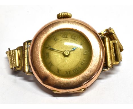 A LADIES VINTAGE 9CT ROSE GOLD WRISTWATCH  On a plated bracelet inscription to watch back for 1933, 28mm diameter.