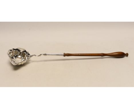 A George II silver toddy ladle, with turned wooden handle, London, 1752, 36.3cm.