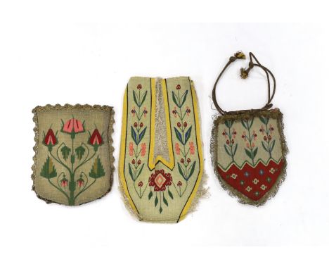 A pair of early 20th century uncut metallic floral tapestry slipper fronts, and two similar unused ladies draw string evening