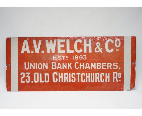 An enamel advertising sign: A.V. Welch &amp; Co, and an Eastport Lane aluminium street sign, latter 105cm long
