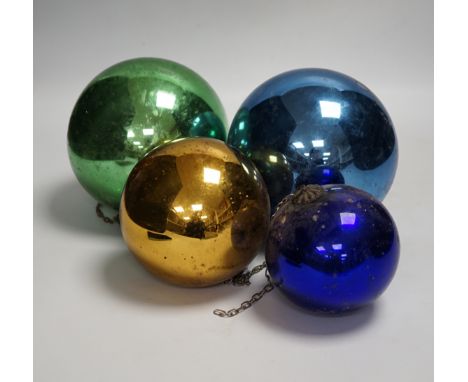 Four various metallic coloured witch’s balls, (dark blue, green, gold and light blue)