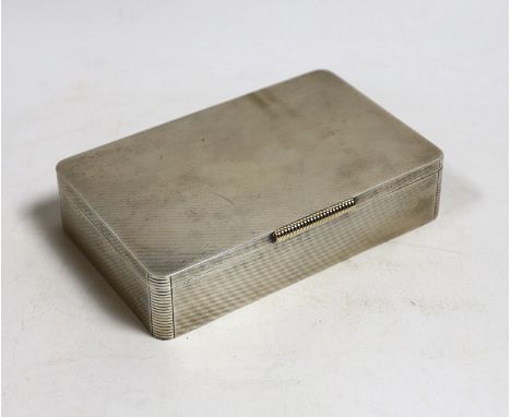 A George VI engine turned silver mounted rectangular cigarette box, Padgett &amp; Braham Ltd, London, 16.5cm.