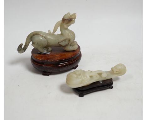 A Chinese pale celadon and grey jade mythical beast on stand, and a pale celadon jade belt hook, mythical beast 11cm wide